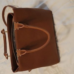 Brown purse with handles and crossbody strap